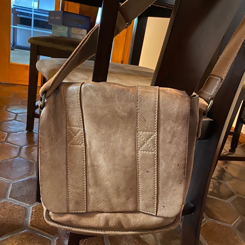 A man needs his space.Style in this Crossbody​